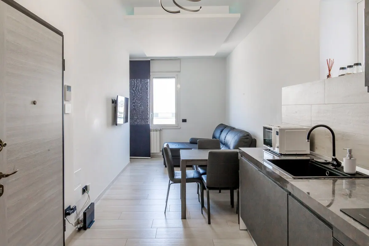 Attico Bicocca, Wohnzimmer mit Küche 3 — Apartment in Bicocca, Mailand