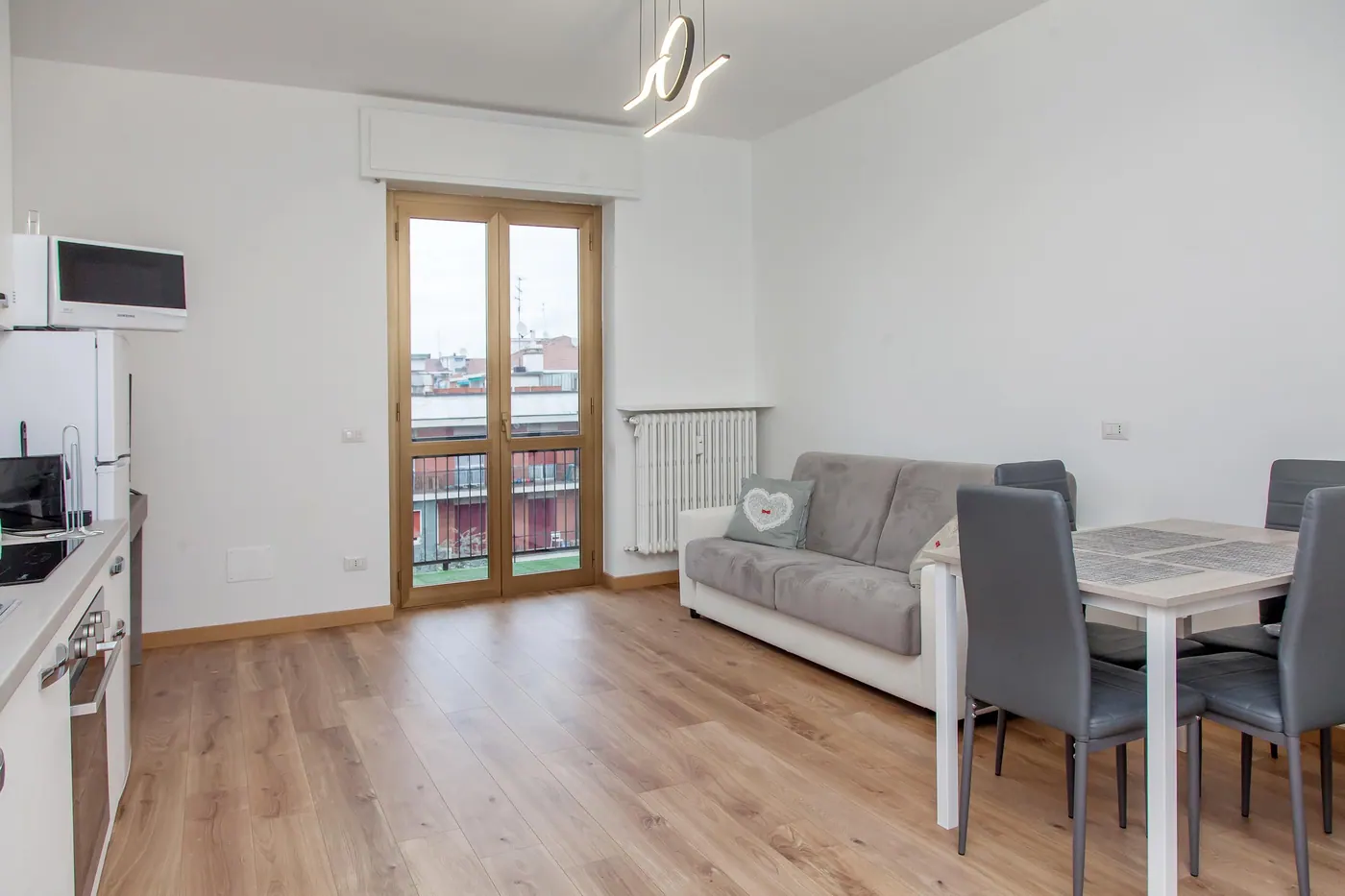 Casa Savoldo, soggiorno con cucina 1 — appartamento a Bicocca, Milano