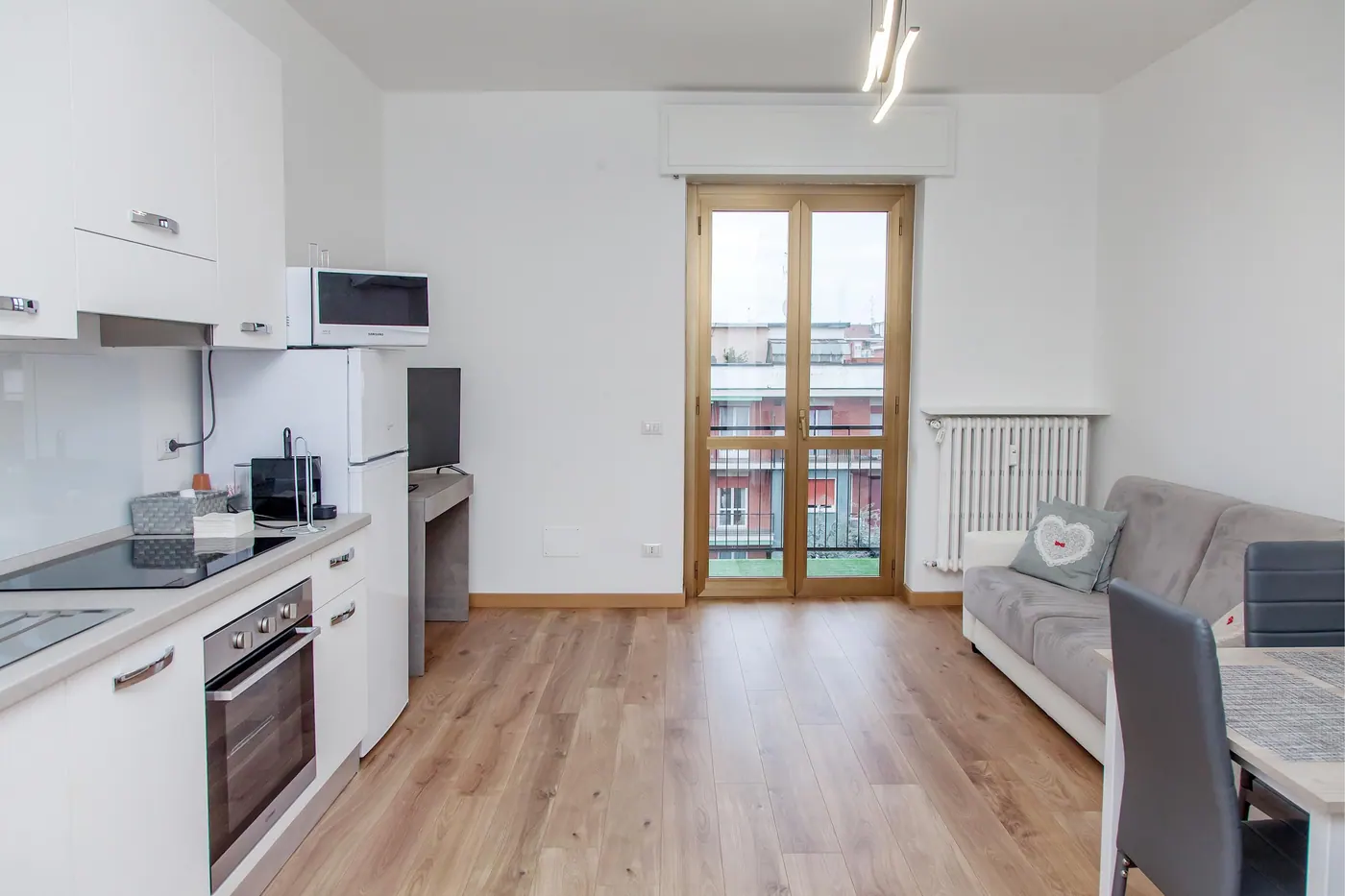 Casa Savoldo, soggiorno con cucina 5 — appartamento a Bicocca, Milano
