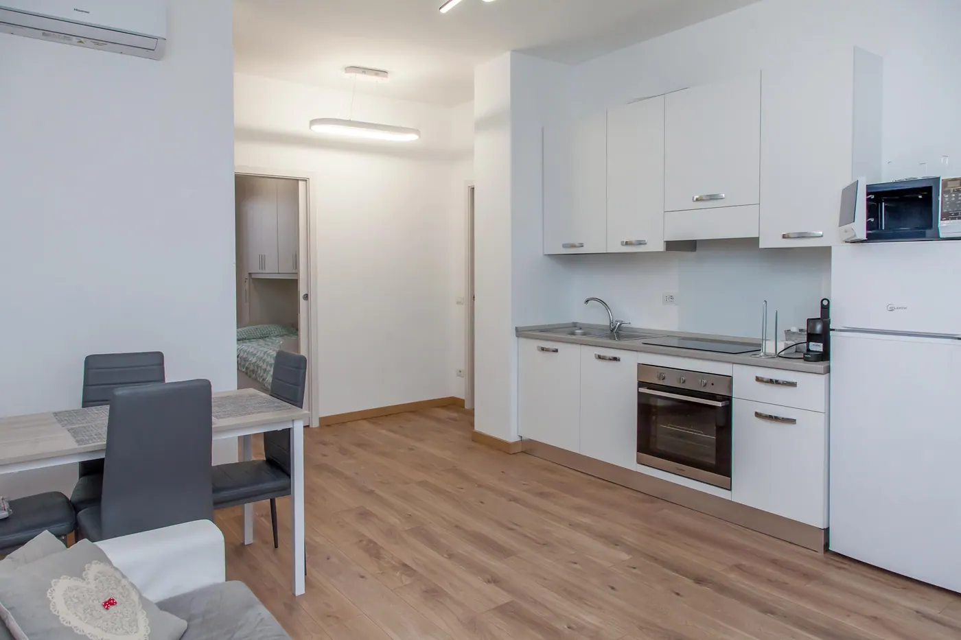 Casa Savoldo, soggiorno con cucina 6 — appartamento a Bicocca, Milano